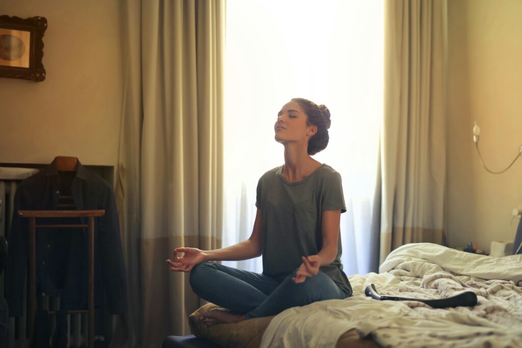 a woman meditating
